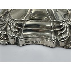 Pair of late Victorian silver mounted candlesticks, each of knopped and part fluted form, upon square stepped base with anthemions to each corner, with conforming sconces, hallmarked to removable sconces and foot, Thomas A Scott, Sheffield 1901, H25.2cm