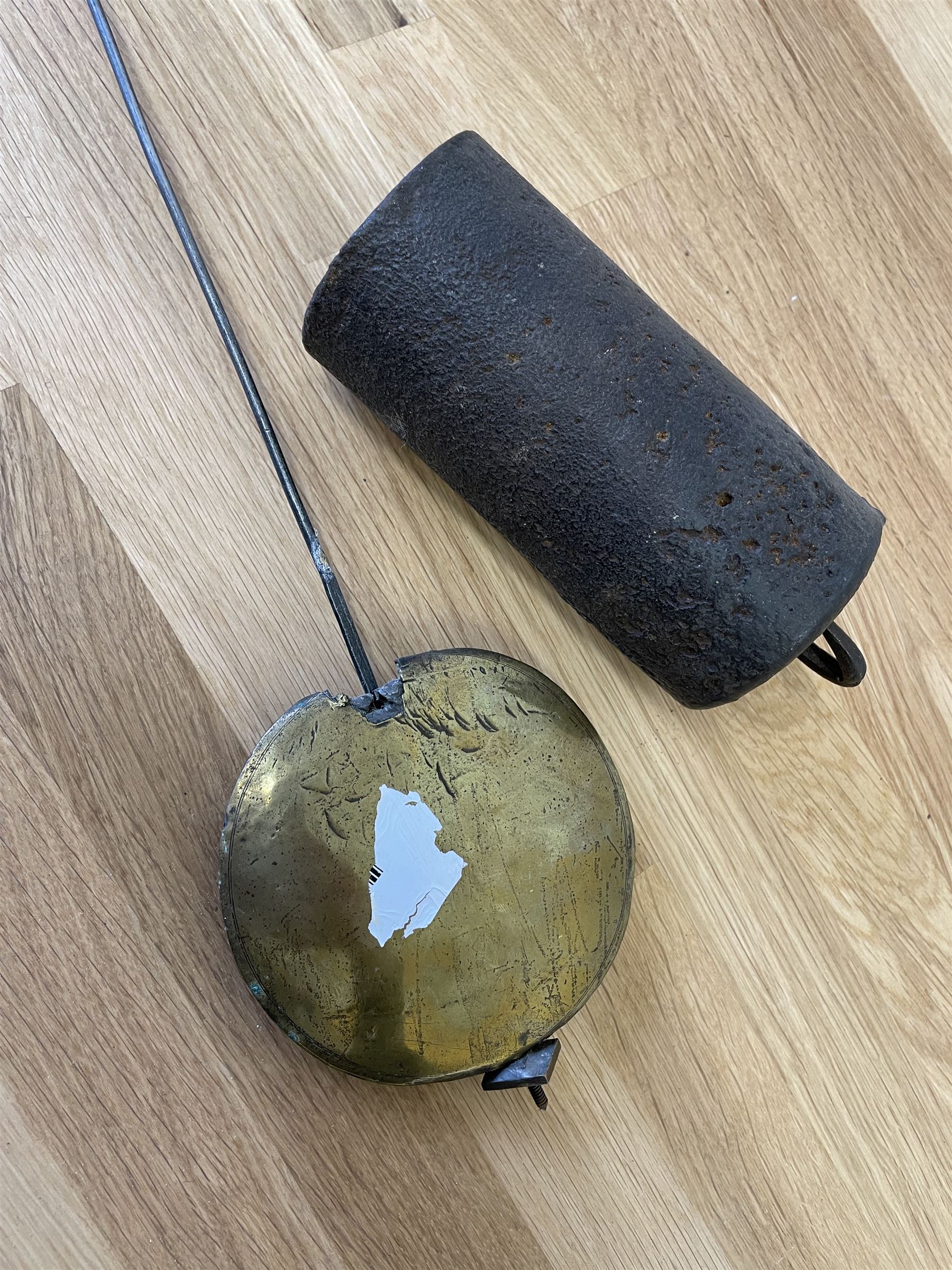 18th century c1760 oak cased George III longcase clock by William Eastwood of Burnley, with a stepped caddy top on a projecting cornice and blind frieze, square glazed door flanked by two turned pillars with gesso capitals, trunk with conforming recessed pillars and a full length wavy topped door, on a square plinth with a raised panel and shaped skirting, 12” square brass dial, 11” chapter ring with Roman numerals and five-minute Arabic's,  