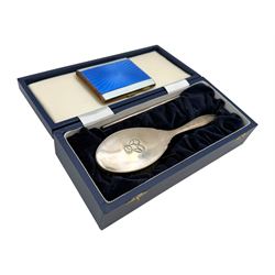 Silver mounted baby brush in case with personal engraving, hallmarked and a Nelson enamel ...