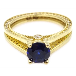  9ct gold blue sapphire and cubic zirconia dress ring, stamped 375  