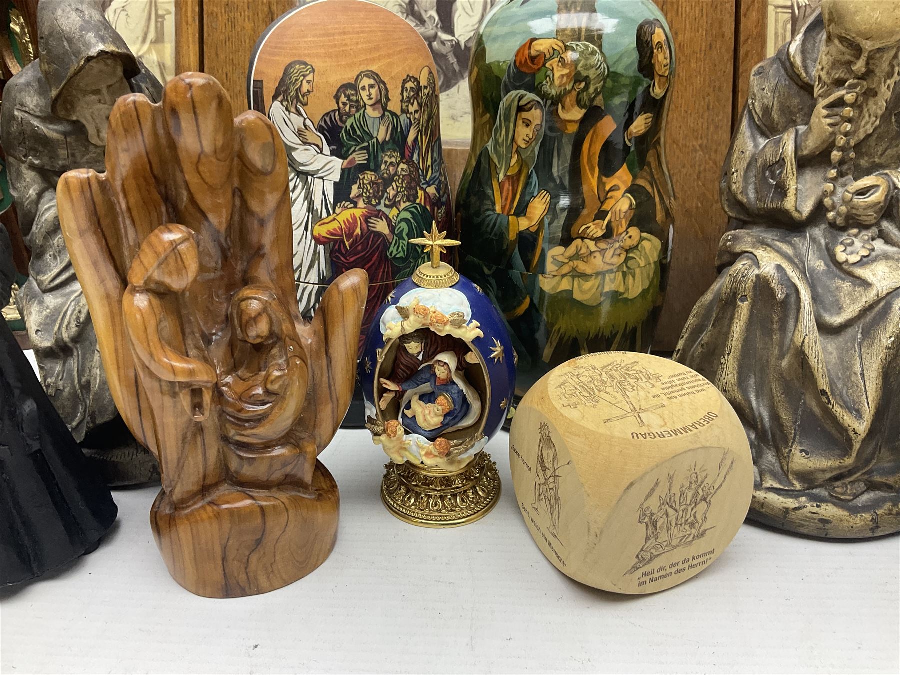 Franklin Mint House of Faberge 'The Nativity' ceramic egg, together with a Russian doll decorated with nativity scenes, Cinque Ports Pottery monk salt and pepper shaker and other monk figures, etc