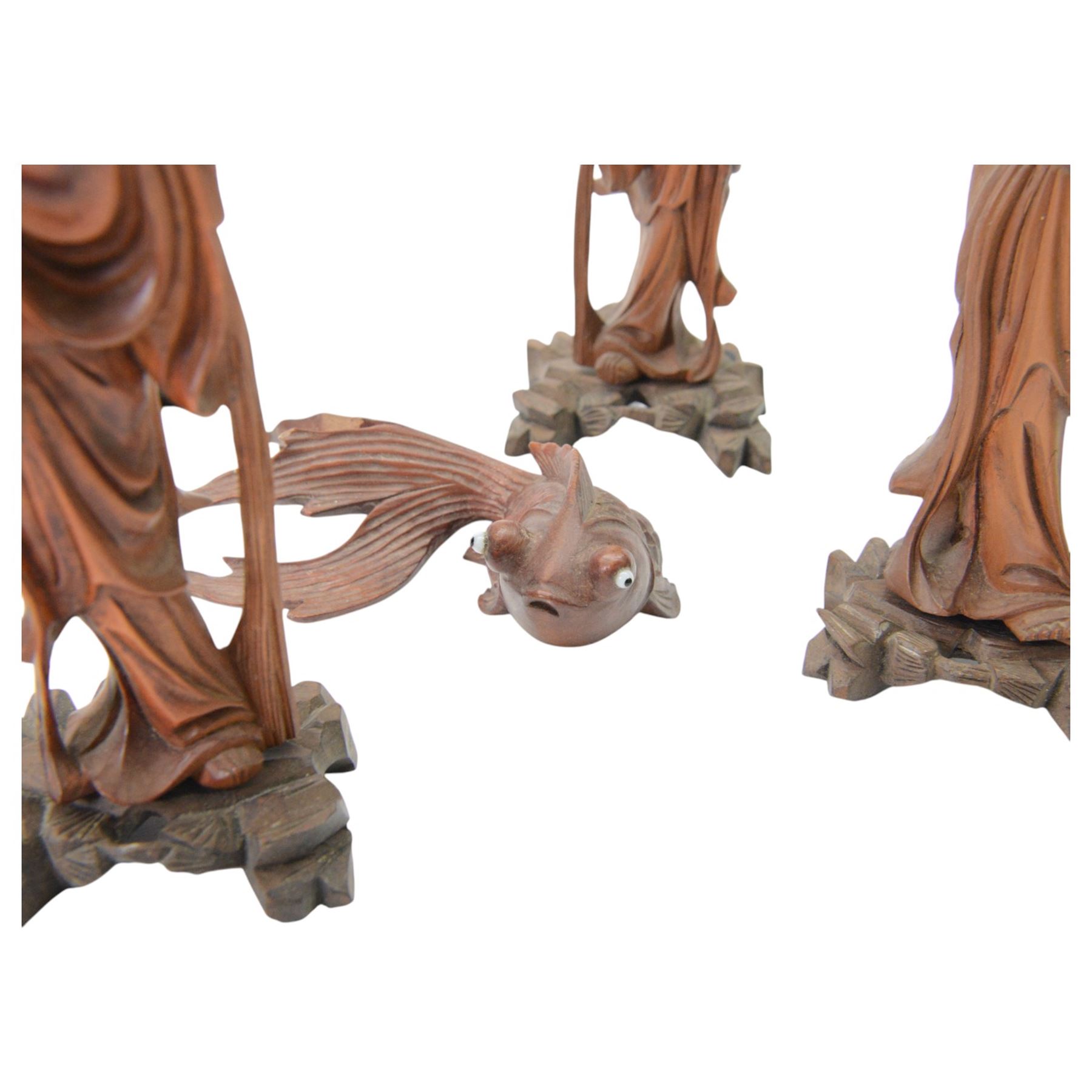 Collection of Chinese carving including a Shubunkin and various immortals 