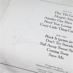Queen 'The Game' signed vinyl record, signed to the reverse of the mirrored silver sleeve by Freddie Mercury, Roger Taylor and John Deacon, released by EMI records 1980

Provenance by vendor repute: Queen played at Elland Road in Leeds 29th May 1982; the vendor met the band the day before and had this record signed by the three members, but Brian May had not yet got off the train. The vendor called up the hotel and impersonated the band's then manager, Gerry Stickles, (by putting on an Australian accent!) to ask what time the band were arriving, then waited for them at the hotel.