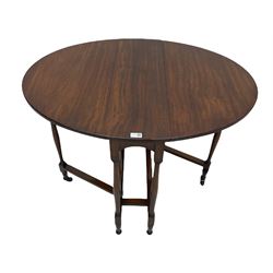 20th century mahogany table, oval drop leaf top, gateleg action base on turned supports