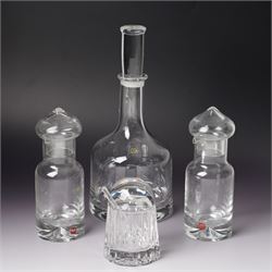 Three Dartington Crystal examples designed by Frank Thrower, comprising two oils and vineg...