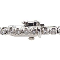 White gold round brilliant cut diamond line bracelet, hallmarked, total diamond weight approx 1.00 carat