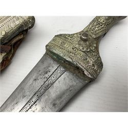 Saudi Arabian khanjar dagger with 29.5cm curving double edged  steel blade; white metal and copper mounted horn grip; in white metal mounted brass and leather scabbard incorporating embroidered leather wearing strap