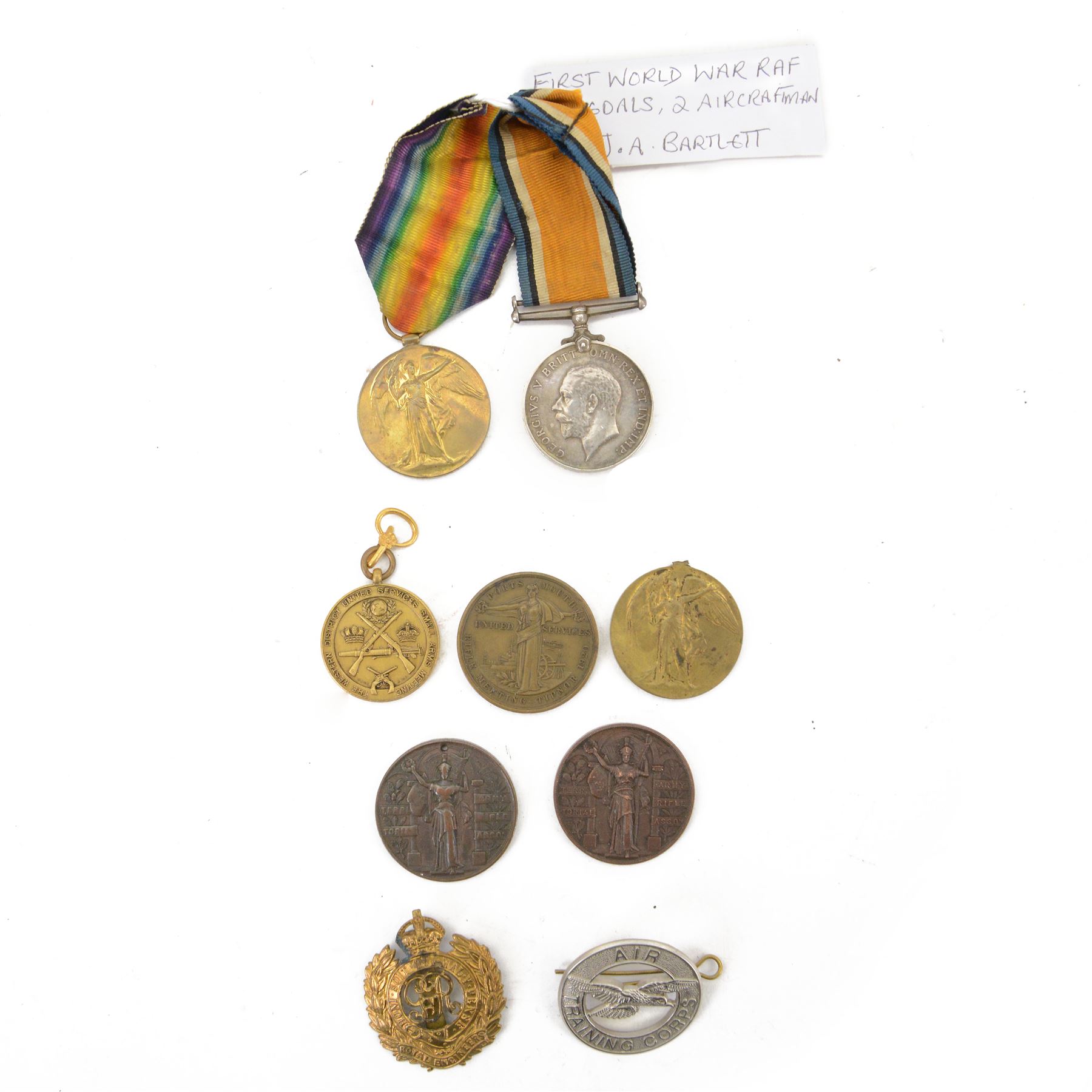WWI pair of medals comprising British War Medal and Victory Medal awarded to 34859 Pte. A.H. White Royal Hampshire Regiment, together with RAF Cap Badge, Royal  Engineers Cap badge and other medals 