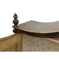 Early 20th century Italian walnut armoire wardrobe, the pierced and scrolling pediment carved with acanthus leaf detail, flanked by two scrolling cartouche with matching corbels below, the two panelled doors with applied carved rinceaux slips, with a central spiral turned upright, enclosing single shelf and hanging rail, raised on scroll feet