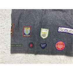 Boy Scout Interest; Scout blanket with collection of Boy Scouts cloth insignias and similar, to include badges from Lealholm North Yorkshire, Cleveland Country, South Shields etc, approximately 115 badges  