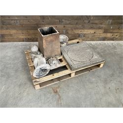 Collection of three Victorian and early 20th century reclaimed terracotta chimney pots, comprising: one cylindrical form with weathered, cracked glaze and flared octagonal base; one deep red cylindrical pot with fluted midsection and castellated rim, bearing moulded number ‘25’; and one tapering hexagonal example with wide flared rim and weathered patina. All with age-related wear and chips, consistent with use and outdoor exposure. Plus a selection of cast stone pieces including fountain 