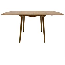 Ercol - elm and beech dining table, rectangular drop-leaf top on splayed square tapering supports 