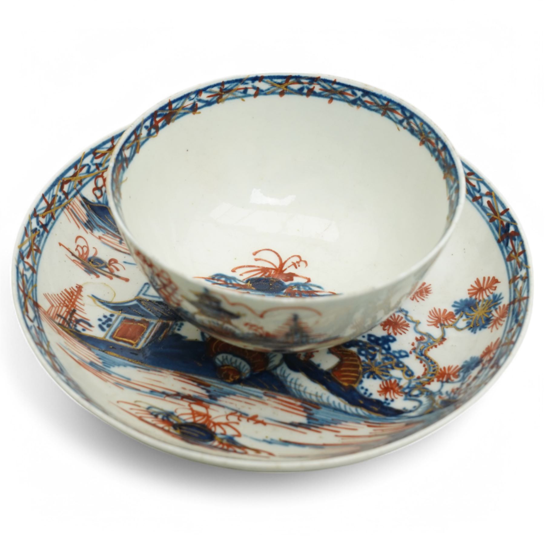 18th century Caughley tea cup and saucer of fluted design decorated in blue and gilt, blue 'S' mark, Bloor Derby coffee can and saucer in red, blue and gilt; 18th century Worcester tea bowls decorated in the Pleasure Boat or Fishermans pattern, and a Liverpool tea bowl decorated in the Penningtons Cannonball pattern