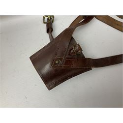 British Army General Staff officer's peaked cap by Herbert Johnson London in Moss Bros. delivery box; two officer's Sam Browne leather belts; leather pistol holster and sword hanger; pair of leather gloves and pair of spurs