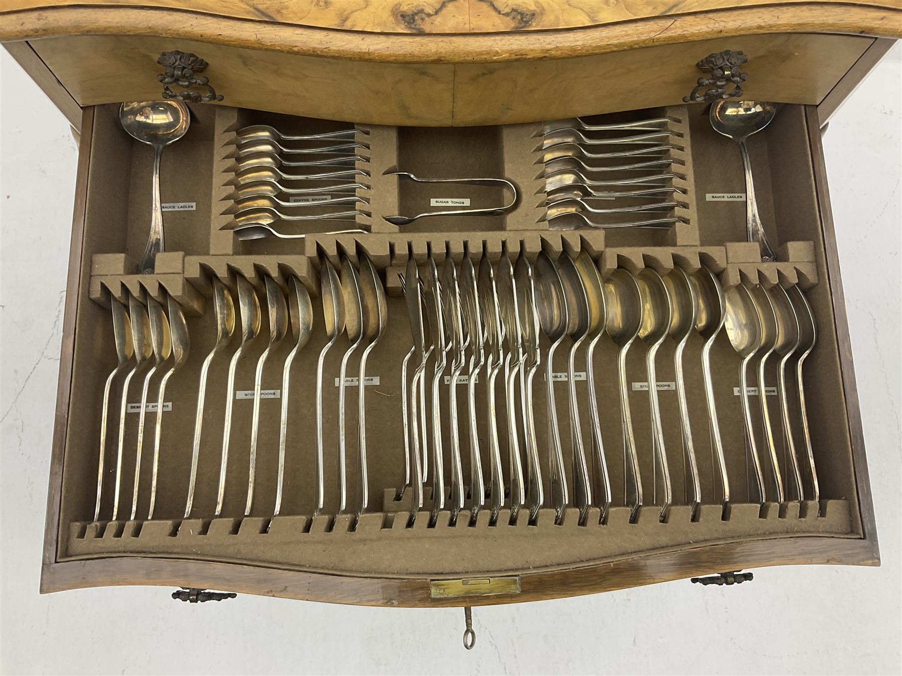 Canteen of Robert F. Mosley Rusnorstain silver-plate cutlery, eight settings- complete, in walnut two drawer canteen table on cabriole legs 