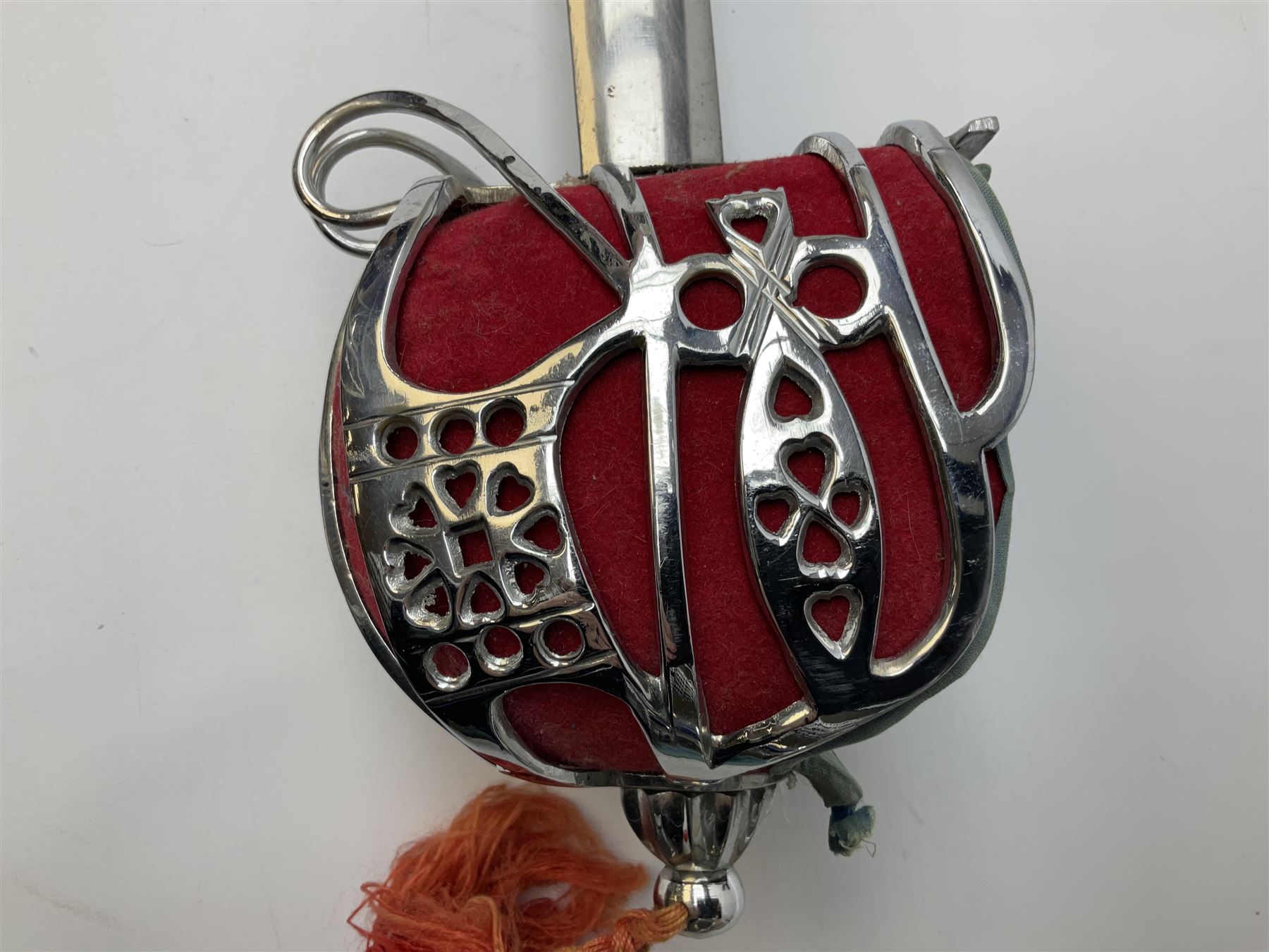Reproduction Scottish basket hilted broadsword with 85cm double edged steel blade and red lined basket hilt with wire bound grip, in white metal mounted leather scabbard 107cm overall