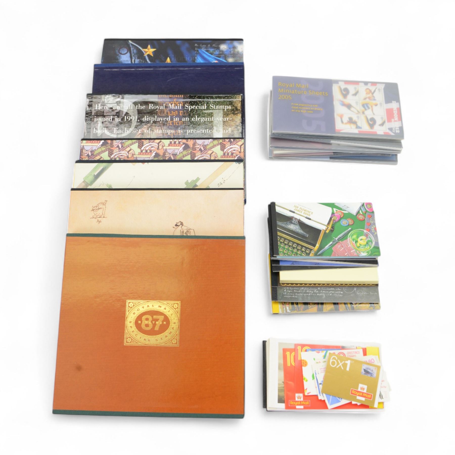 Seven Royal Mail special stamps books, 1986-1992, six Royal Mail miniature sheets packs, 2005-2010, and twenty one Royal Mail Prestige stamp books