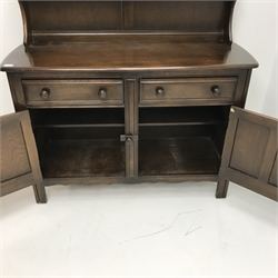 Ercol  Old Colonial elm dresser, raised two tier plate rack above two drawers and two cupboards, W124cm, H161cm, D47cm