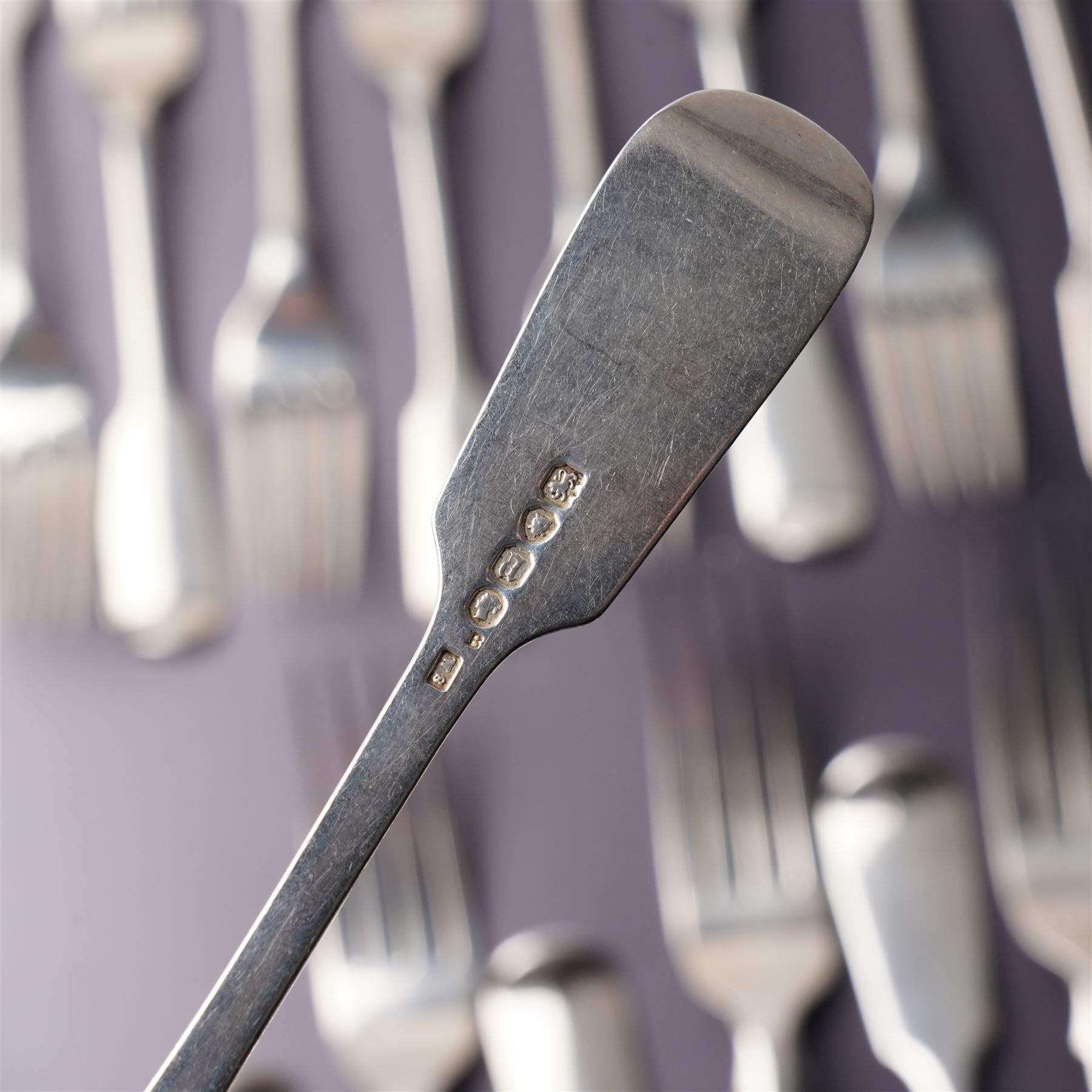 Suite of Victorian silver fiddle pattern cutlery comprising eighteen table forks, seventeen dessert spoons, fifteen dessert forks and three table spoons London 1856 Maker A B Savory & Sons