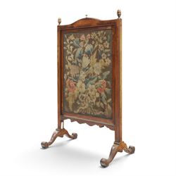 Georgian carved mahogany firescreen, the extending panel with Georgian needlepoint tapestry to one side and Arts & Crafts style machine tapestry to the opposing, on splayed supports with scroll feet