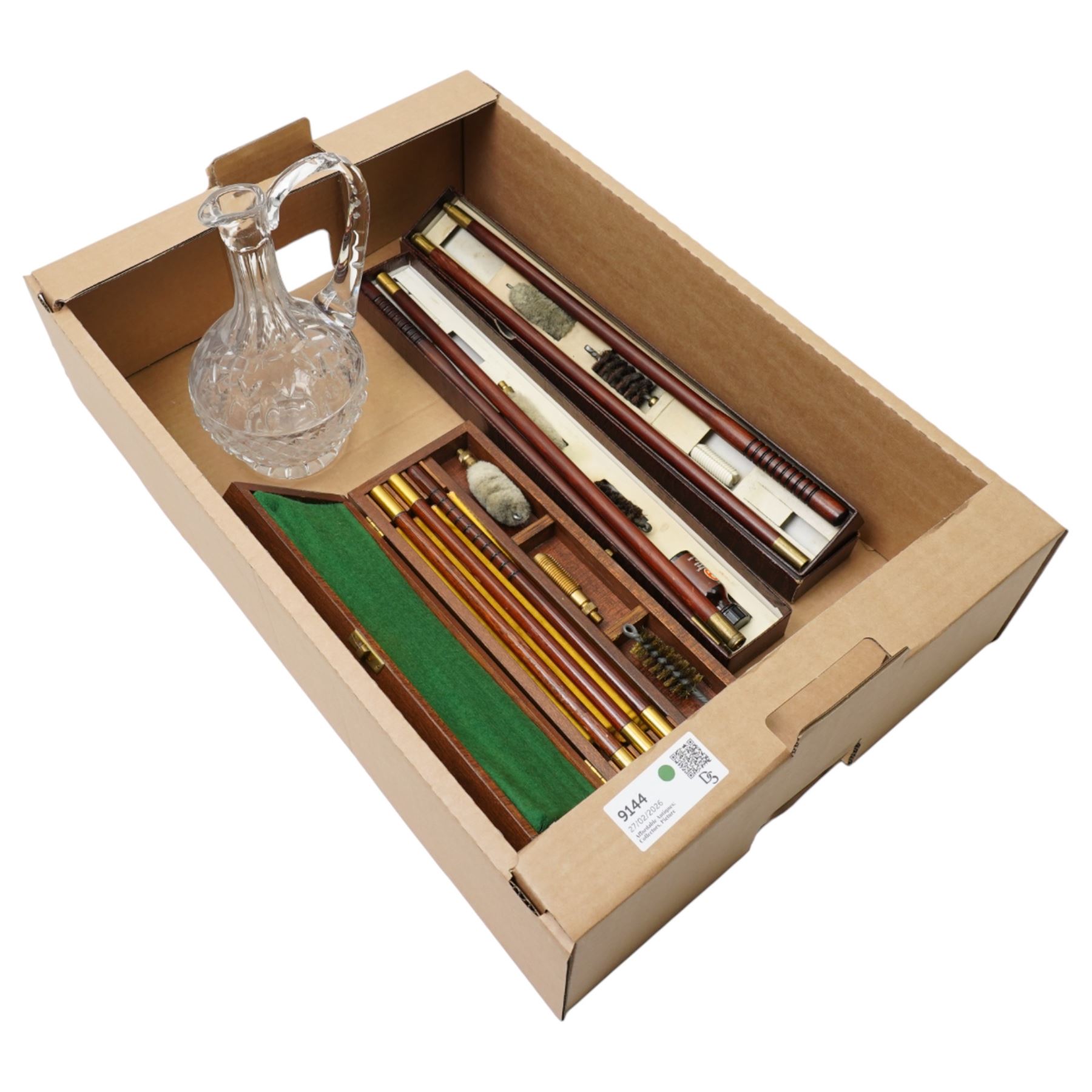 Two Parker Hale shotgun cleaning kits, another cleaning kit in wooden case and a glass jug