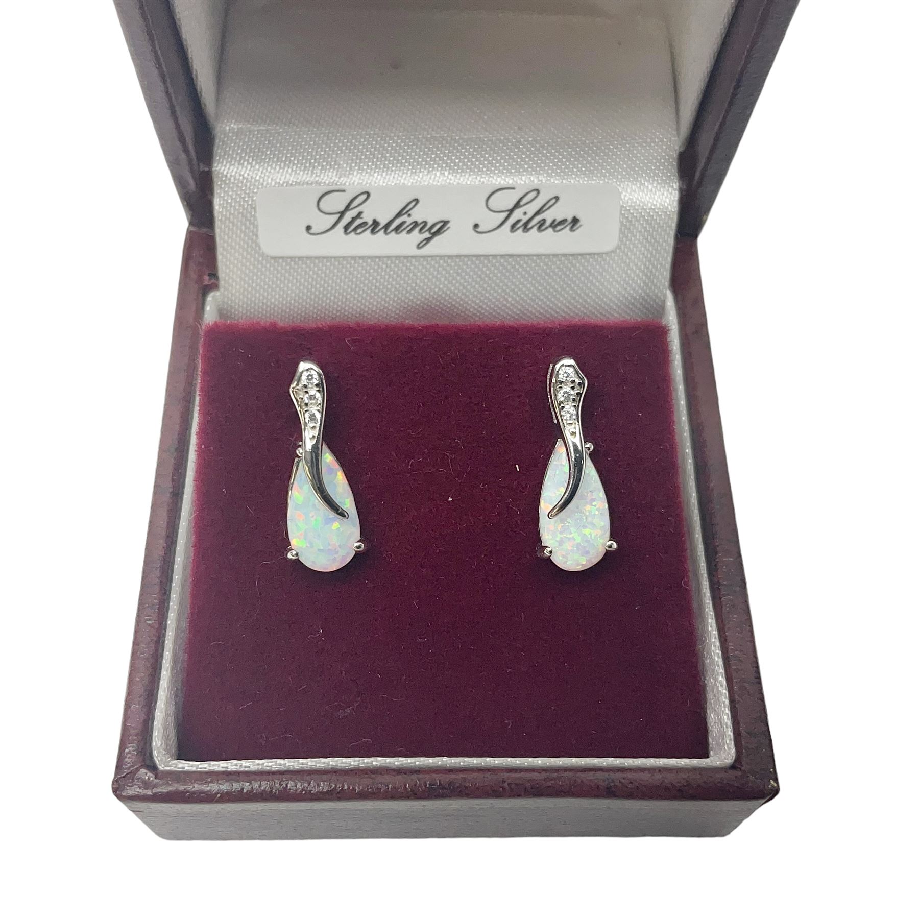 Pair of silver opal and cubic zirconia stud earrings, stamped 925, boxed 