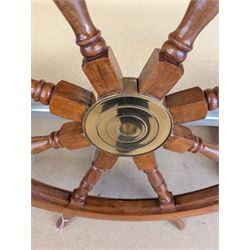 Wooden eight spoke ship's wheel with brass centre, D106cm
