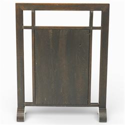 20th century carved fireside accessories; a carved coal bucket with metal liner and a carved fire screen