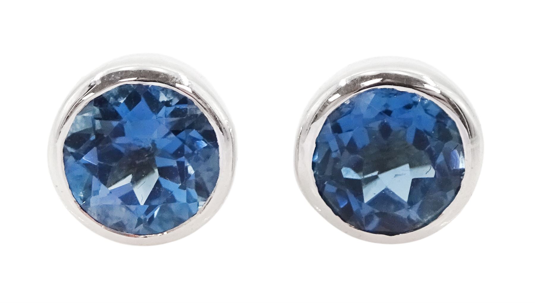 Pair of 9ct white gold round London blue topaz stud earrings, hallmarked, total topaz weight approx 3.10 carat