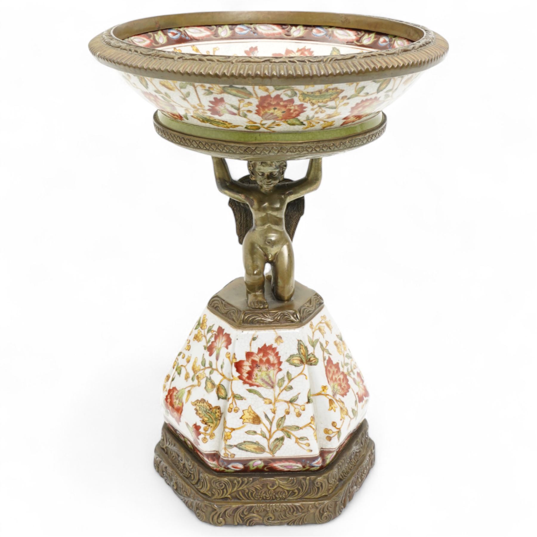 Wong Lee comport, with polychromatic enamel floral decoration, the stem formed as kneeling cherub, marked to base, H37cm 