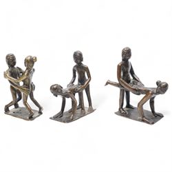 Three Indian school Kama Sutra style erotic bronze figures, H9cm