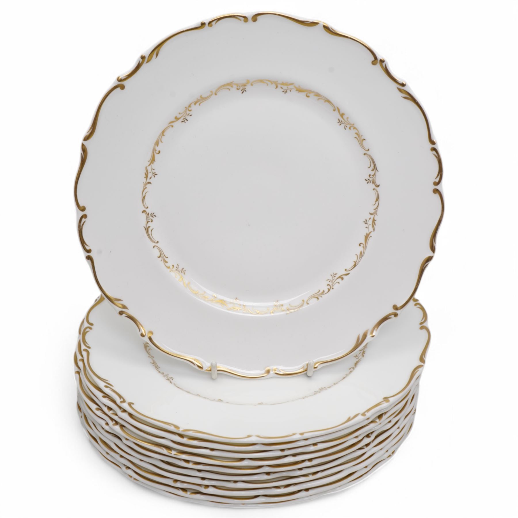 Royal Doulton dinner service in the 'Richelieu' pattern, comprising eleven dinner plates, twenty one dessert plates, twelve soup bowls, eleven dessert bowls, four vegetable dishes, oval serving dishes and graduating meat plates 