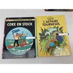 Twenty one first edition Herge, 'The Adventures of Tin Tin' books published by Casterman Bruxelles, with French text and coloured comic strip illustrations throughout; comprising Tintin Au Congo 1946, Tintin En Amerique 1946, Les Cigares du Pharaon 1955, Le Lotus Bleu 1946, L'Oreille Cassee 1943, L'ile Noire 1943, Le Sceptre d O'ttokar 1947, Le Crabe Aux Pinces D'or 1943, L'Etoile Mysterieuse 1942, Le Secret de la Licorne 1943, Le Tresors de Rackan Le Rouge 1945, Les 7 Boules de Cristal 1948, Le Temple du Soleil 1949, Au Pays de L'Or Noir 1950, Objectif Lune 1953, On a Marche sur la Lune 1954, L'Affaire Tournesol 1956, Coke en Stock 1958, Tintin au Tibet 1960, Les Bijous de la Castafiore 1963 and Vol 714 Pour Sydney 1968
