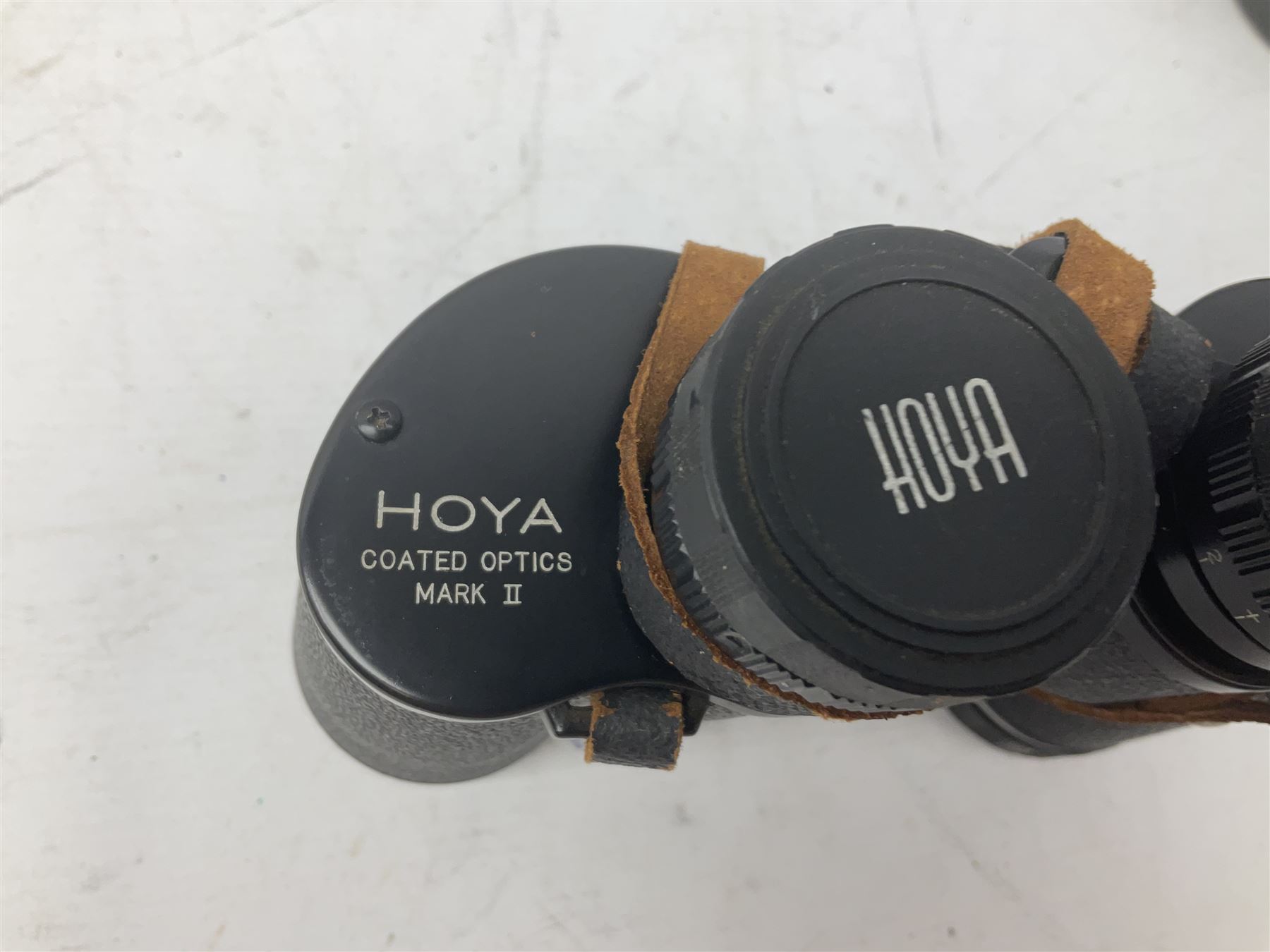 Nine cased pairs of binoculars to include Lieberman & Gortz 12x50, Frank Nipole 8x56, Uniscope, Hoya mark II 8x40, Porst 8x56 etc