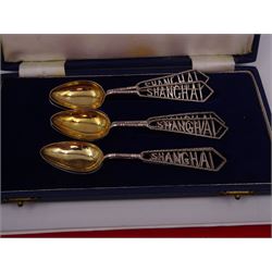 Set of six Chinese silver spoons, each with pierced 'Shanghai' handles, in fitted case, together with a pair of sterling silver chopsticks, by Wai Kee Hong Kong, stamped WK AA Sterling, boxed 