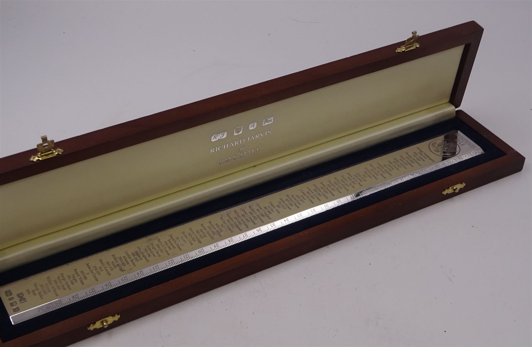 Modern silver 'Presidents Rule' ruler, by Richard Jarvis of Pall Mall, engraved with the names and dates of American Presidents from 1789 to 2001,  hallmarked Richard Jarvis, London 2004, L33.5cm, within silk and velvet lined fitted case
