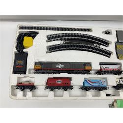 Hornby '00' gauge - Midnight Freight electric train set with Class 58 diesel Co-Co locomotive No.58001, eight wagons, goods shed, track, car loading ramp and power controller etc; boxed with paperwork; together with an additional wagon, figures and platform fencing