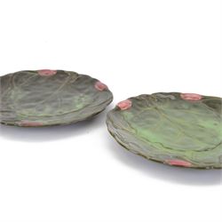 Two Zsolnay Pecs lotus moulded teacups and saucers, with impressed mark beneath