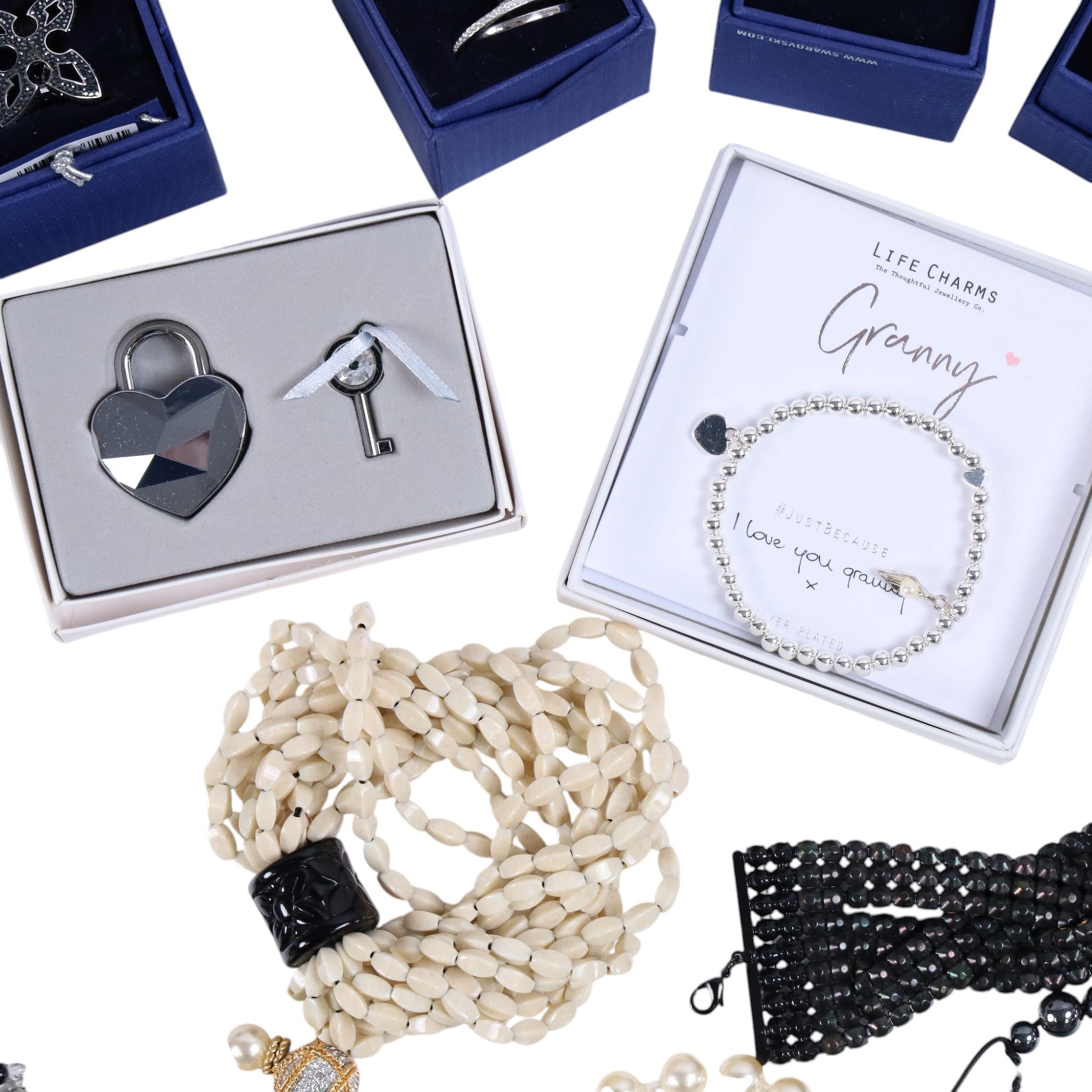 Collection of boxed Swarovski crystal jewellery, including statement necklaces, rings, bracelets and earrings, and a collection of costume jewellery including beaded necklaces