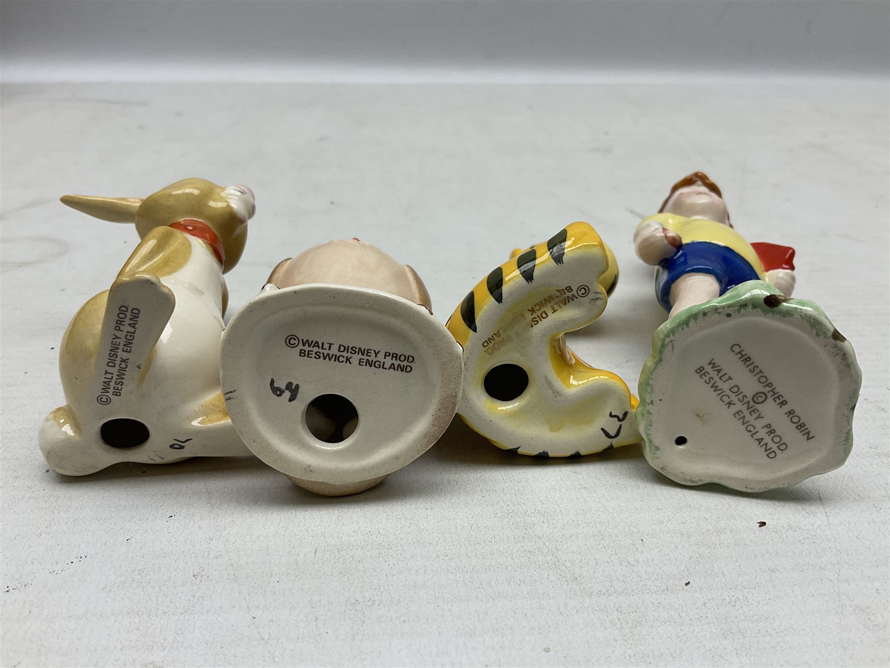 Set of eight Winnie the Pooh Beswick figures, comprising Christopher Robin, Winnie the Pooh, Tigger, Piglet, Rabbit, Eeyore, Owl and Kanger, six with original boxes, tallest H12cm  