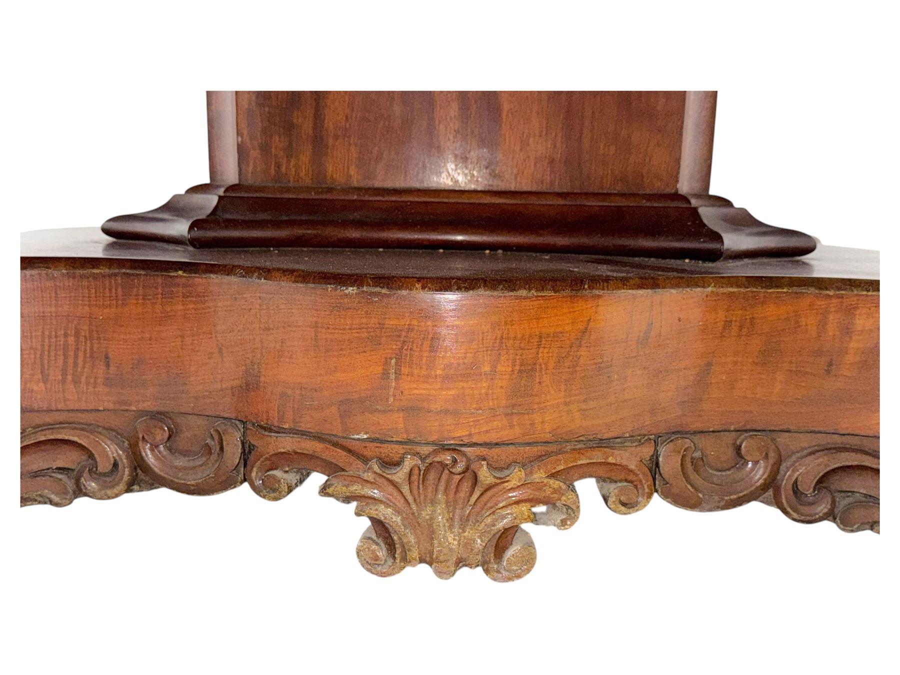 Victorian mahogany tilt-top table dining table, rounded tilt rectangular top with moulded edge, on octagonal column, raised on shaped quadriform base with bold scrolled feet