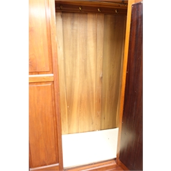  Edwardian walnut single wardrobe, swan neck pediment, projecting cornice, single door with full length bevel edge mirror, single drawer, W123cm, H217cm, D52cm  