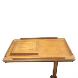 Late Victorian mahogany adjustable reading stand, the rectangular top with moulded and rounded edge and gallery upon a adjustable turned column support, and shaped base