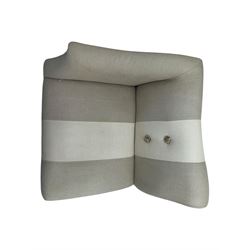 Pair of contemporary hardwood corner chairs, upholstered in broad alternating bands of neutral-toned fabric, each with two knotted rope buttons to the backrest, the whole raised on turned and lightly whitewashed supports terminating in castors