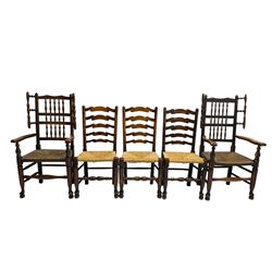 Harlequin set of nine country elm and beech chairs - pair 19th century spindle back carver armchairs with wingbacks, and a mixed set of seven ladderback side chairs, all with rush seats