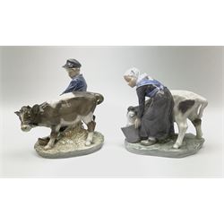 Two Royal Copenhagen figures, boy with calf 772, H17cm and girl with cow 779, H16.5cm