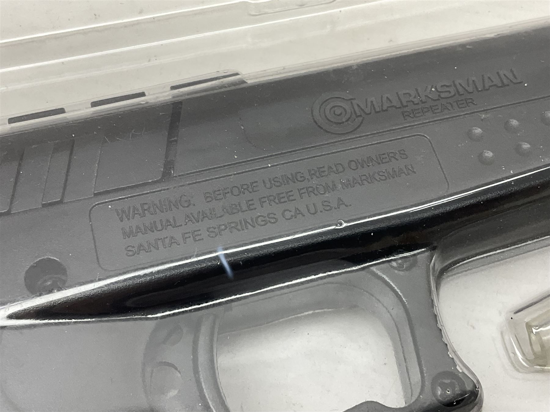 Marksman 1018 spring action BB pistol, serial no.121912951321, L27cm in original packaging with ball dispenser; and KWC .177 cal. CO2 revolver, serial no.31128882, L31cm (2)  NB: AGE RESTRICTIONS APPLY TO THE PURCHASE OF AIR WEAPONS.