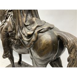 Large and impressive bronze figure of Wellington seated on a horse, on a sarcophogus shaped stepped base impressed 'Meunier Paris', the canted corners inset with battle trophies H68cm L50cm D22cm