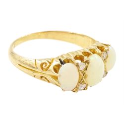 Early 20th century 18ct gold opal and diamond ring, three graduated oval cut opals, spaced by four accent diamonds