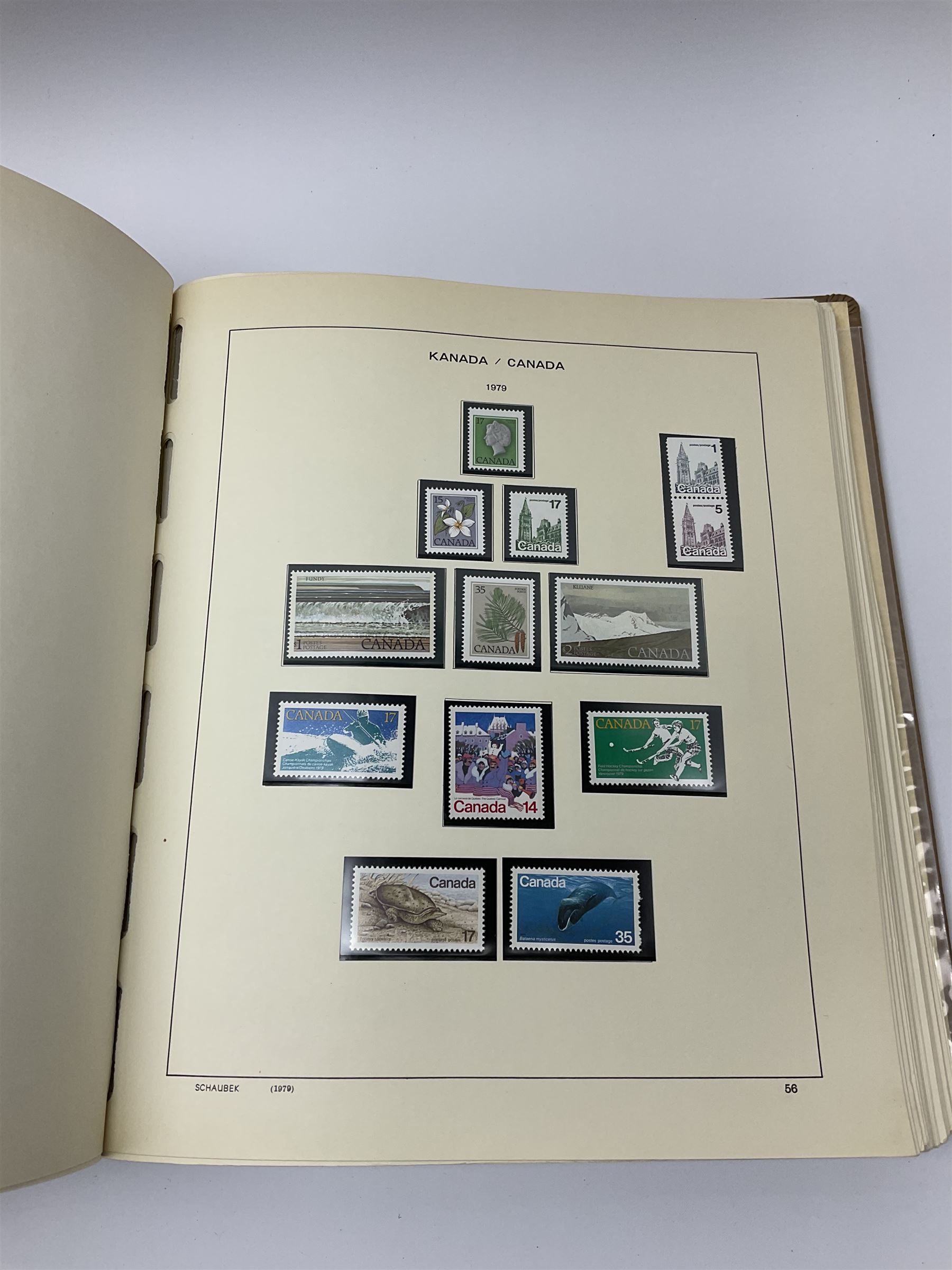 Collection of mostly mint Canadian stamps from 1952 onwards, including some higher values, housed in a 'Schaubek Briefmarken Album Nr944 Kanada' 